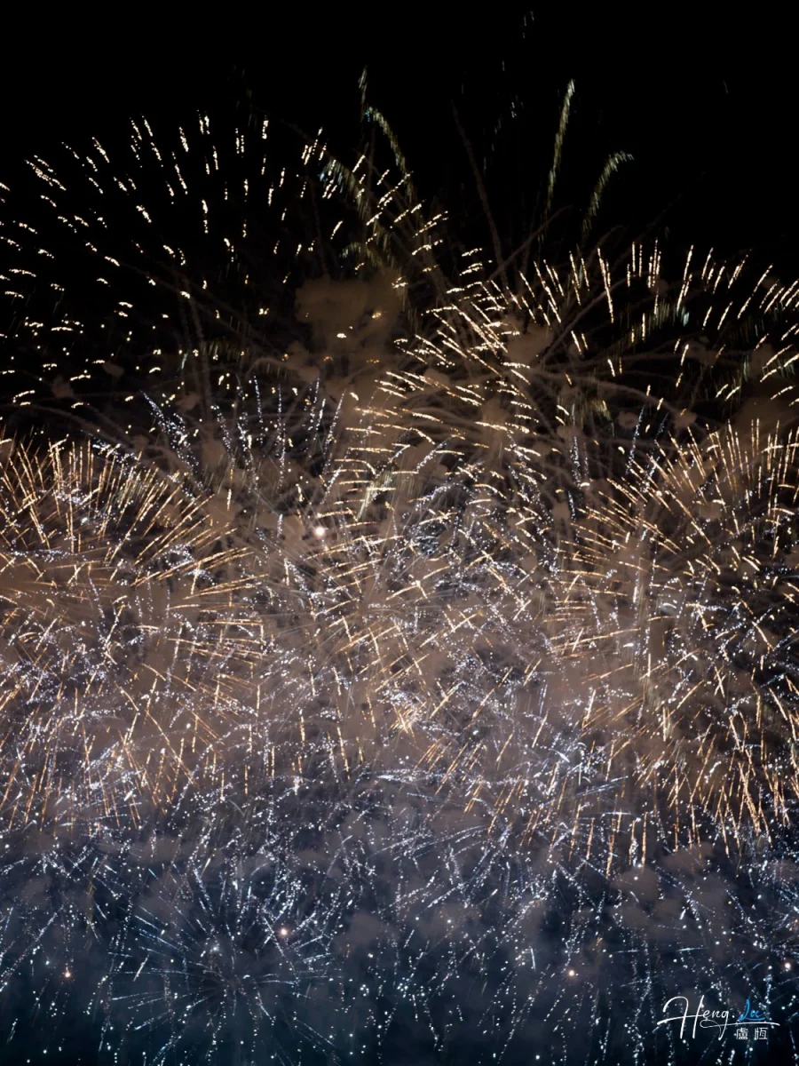 Gold And Silver Fireworks Filling Night Sky