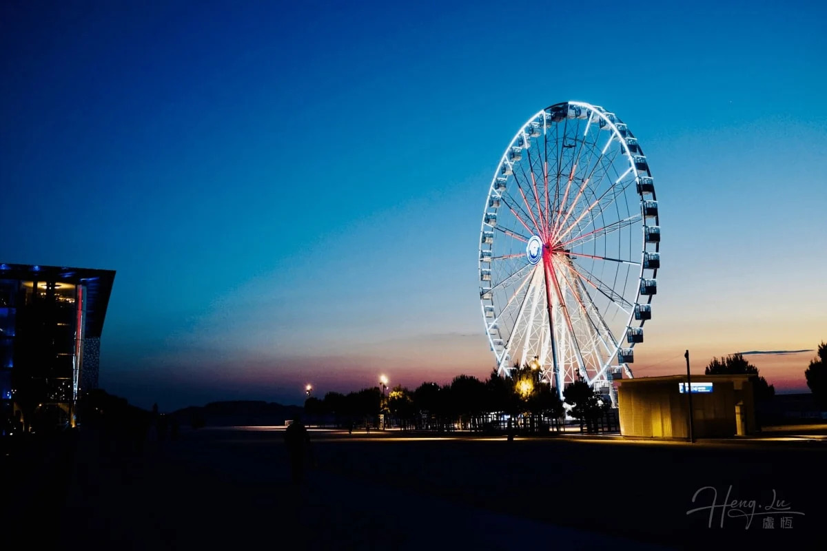 Enchanting Marseille Ferris Wheel Illuminated at Dusk