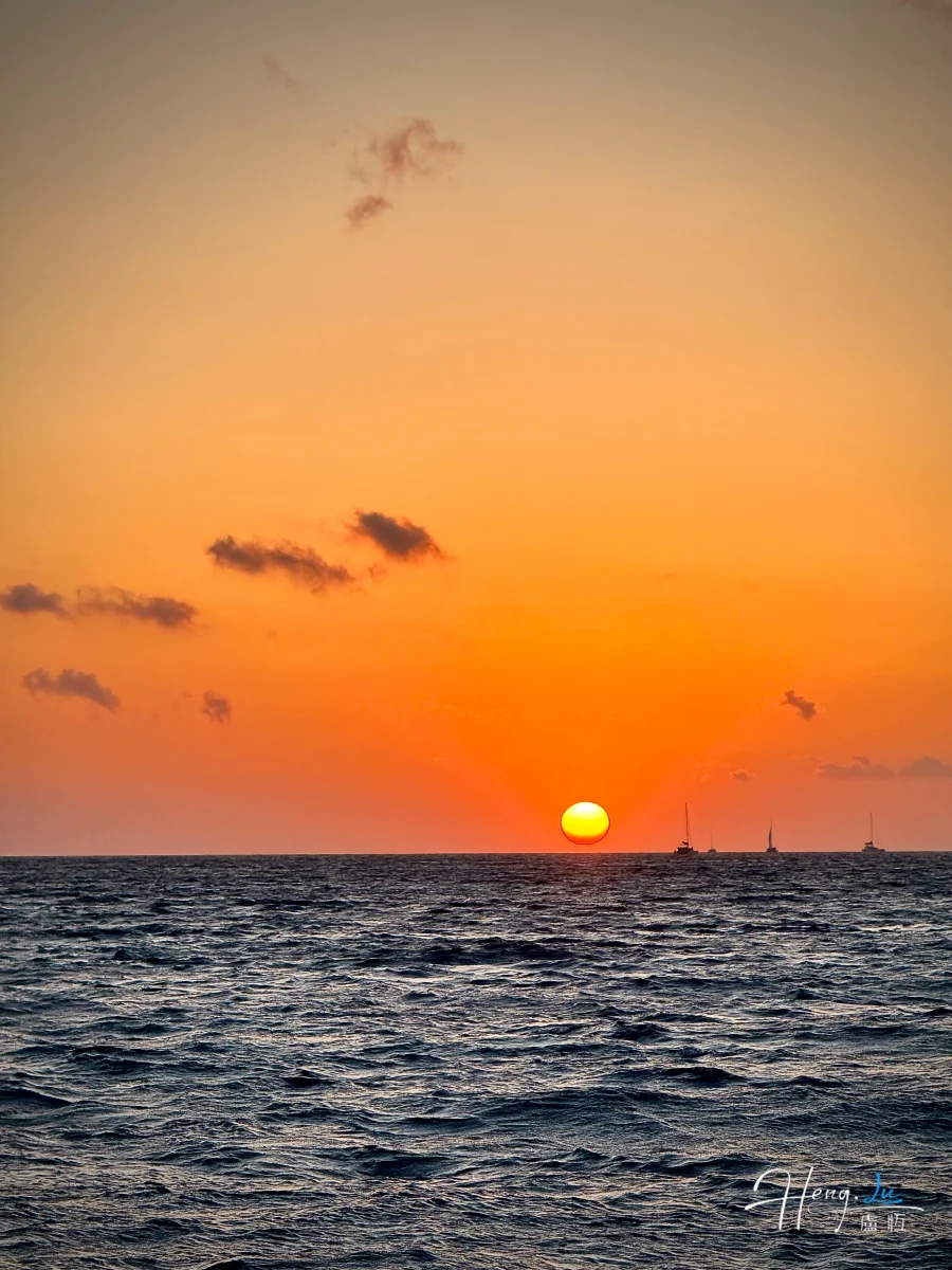 sunset-over-ocean-with-sailing-boats (1)