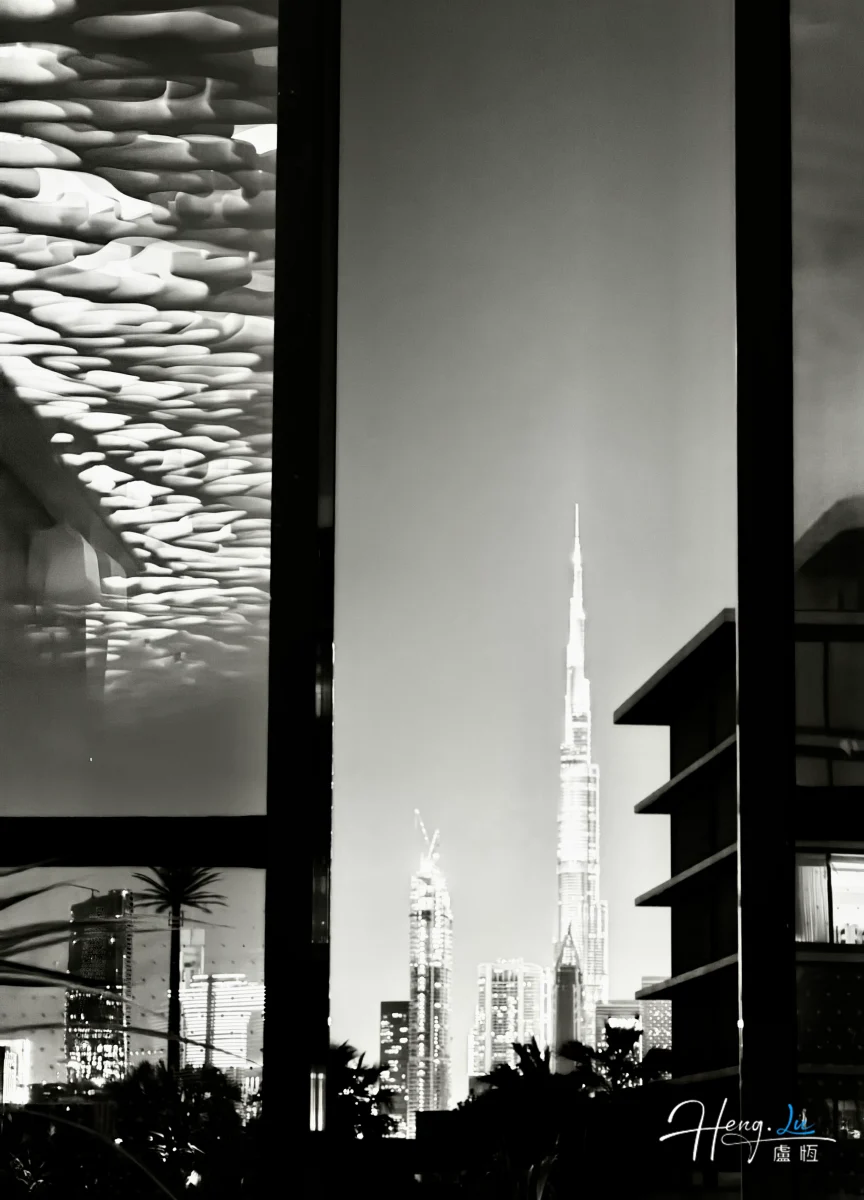 Cityscape View Of Burj Khalifa Through Glass Window