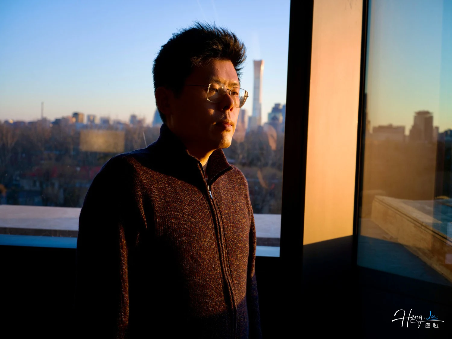 Luheng in sunlight looking outside modern window