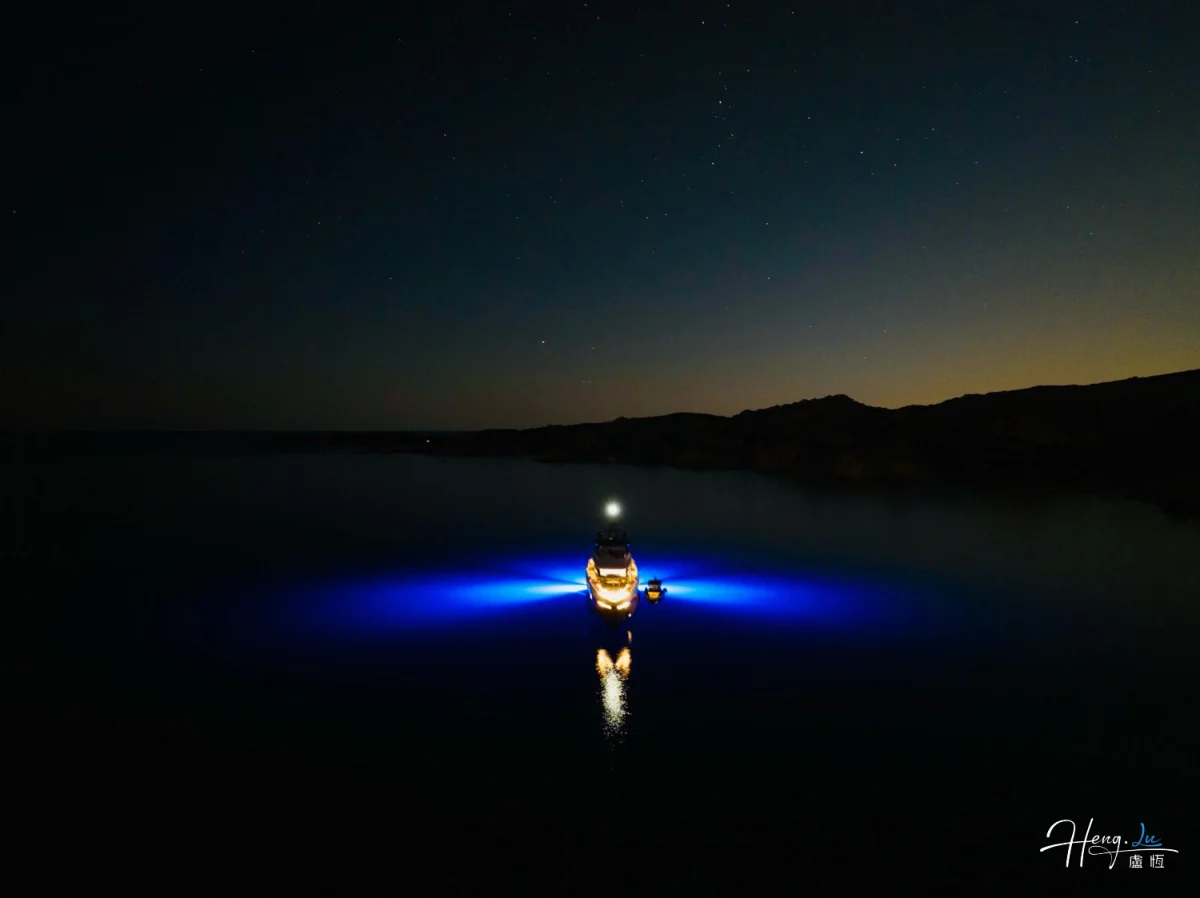 Boat Glowing Blue Lights At Night