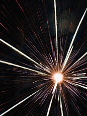 Radiant Firework Burst Illuminates Night Sky