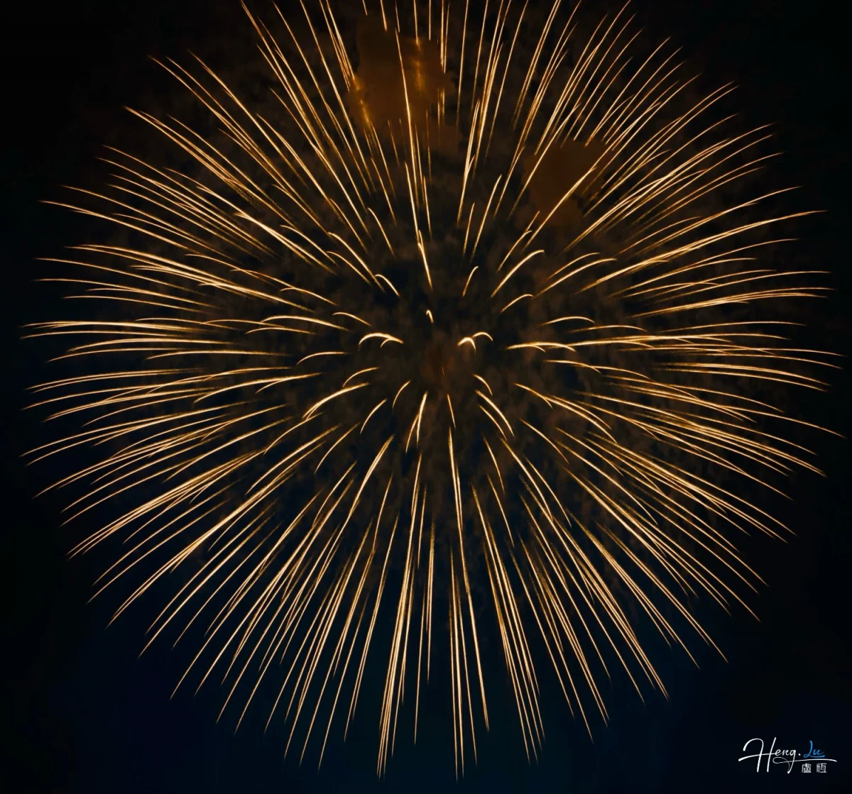 Brilliant Golden Streaks Spread Like Sunburst Across Night Sky