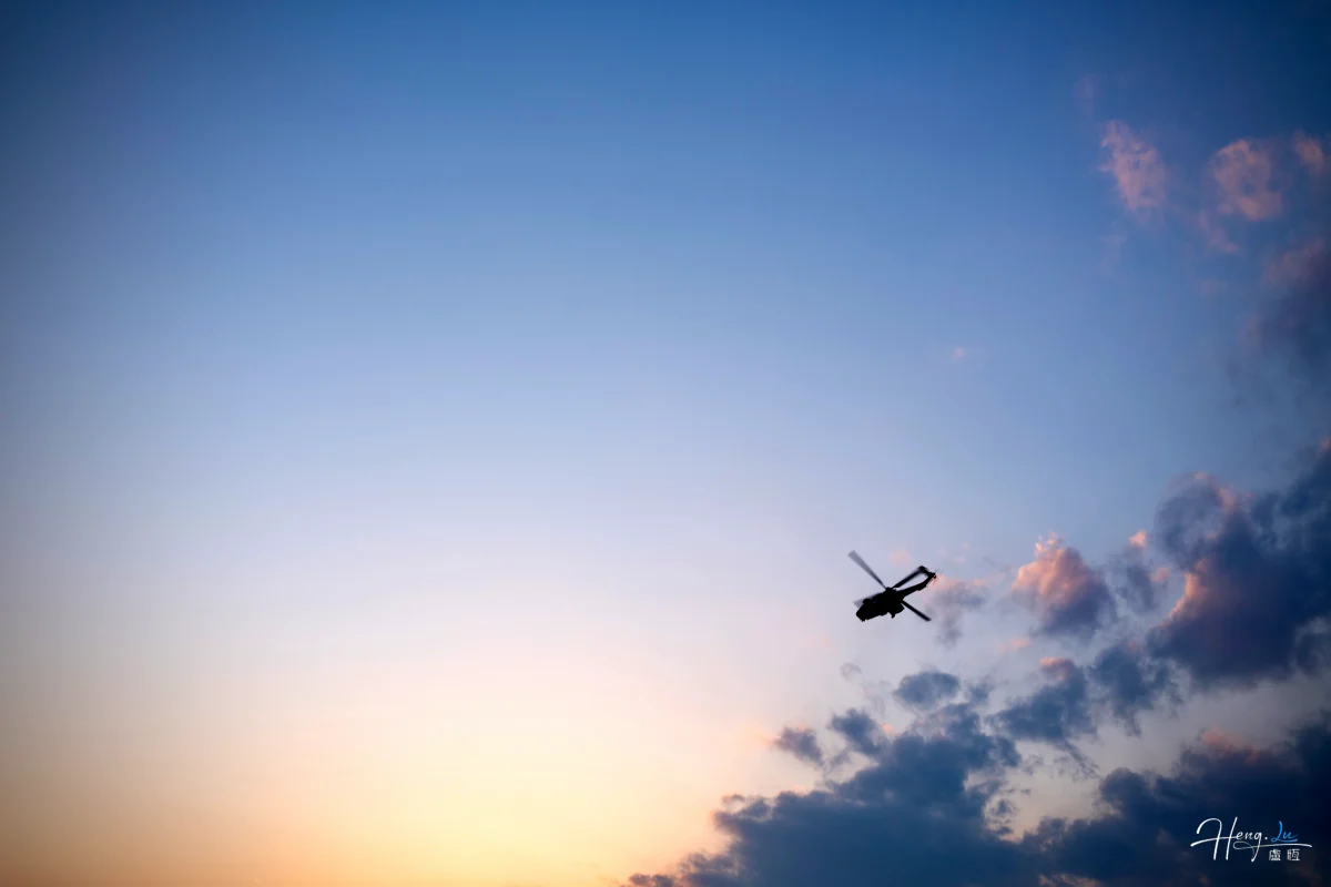 helicopter-flying-through-sunset-sky (1) (1)