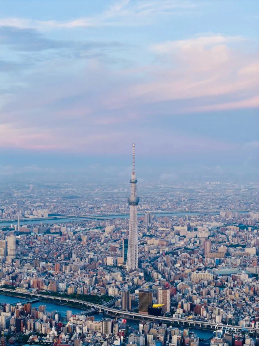 Cityscape With Prominent Television Tower At Dusk