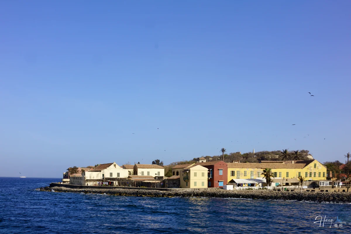 Colorful Coastal Houses By Blue Sea