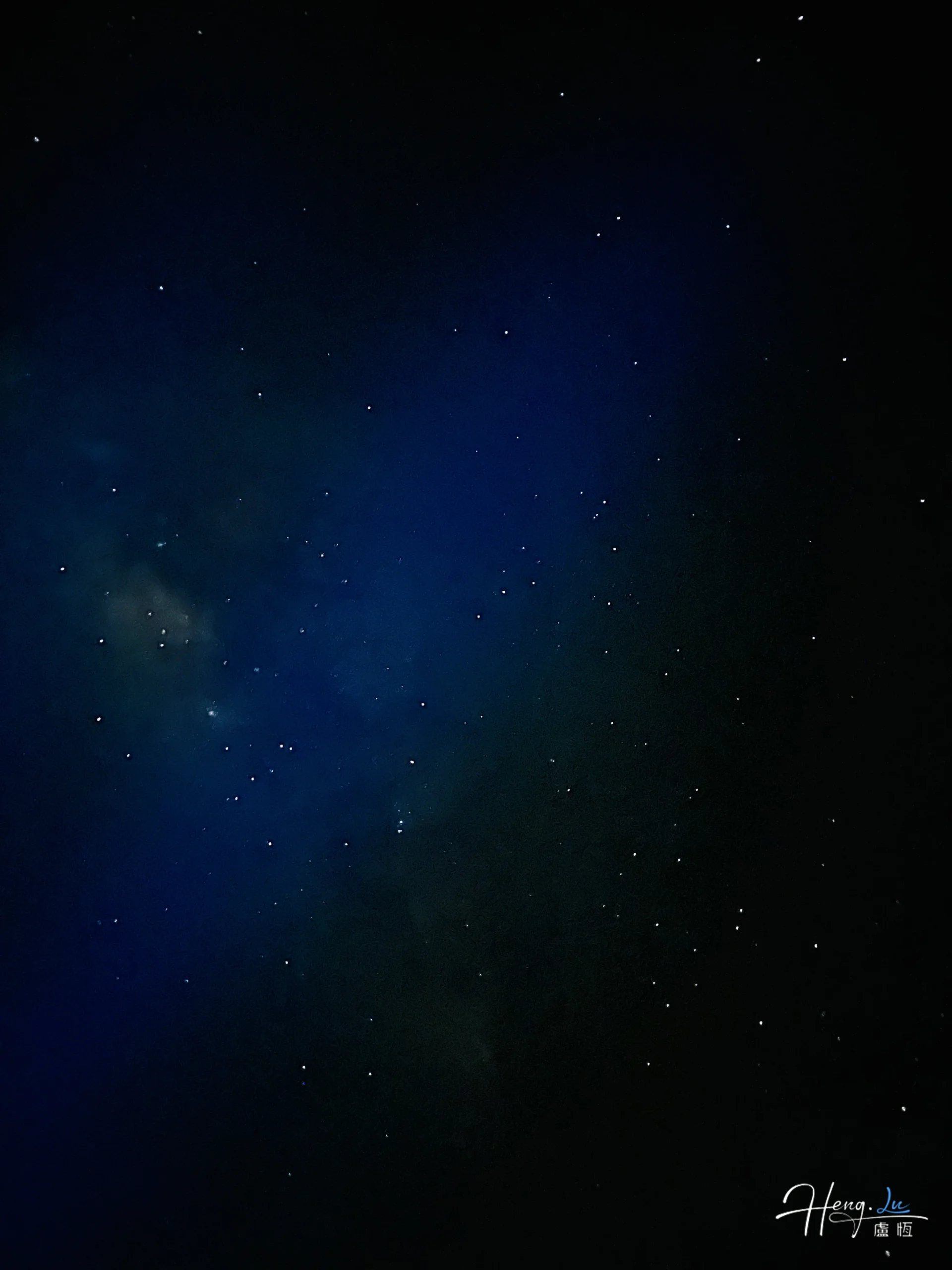 Starry night sky with deep blue gradient