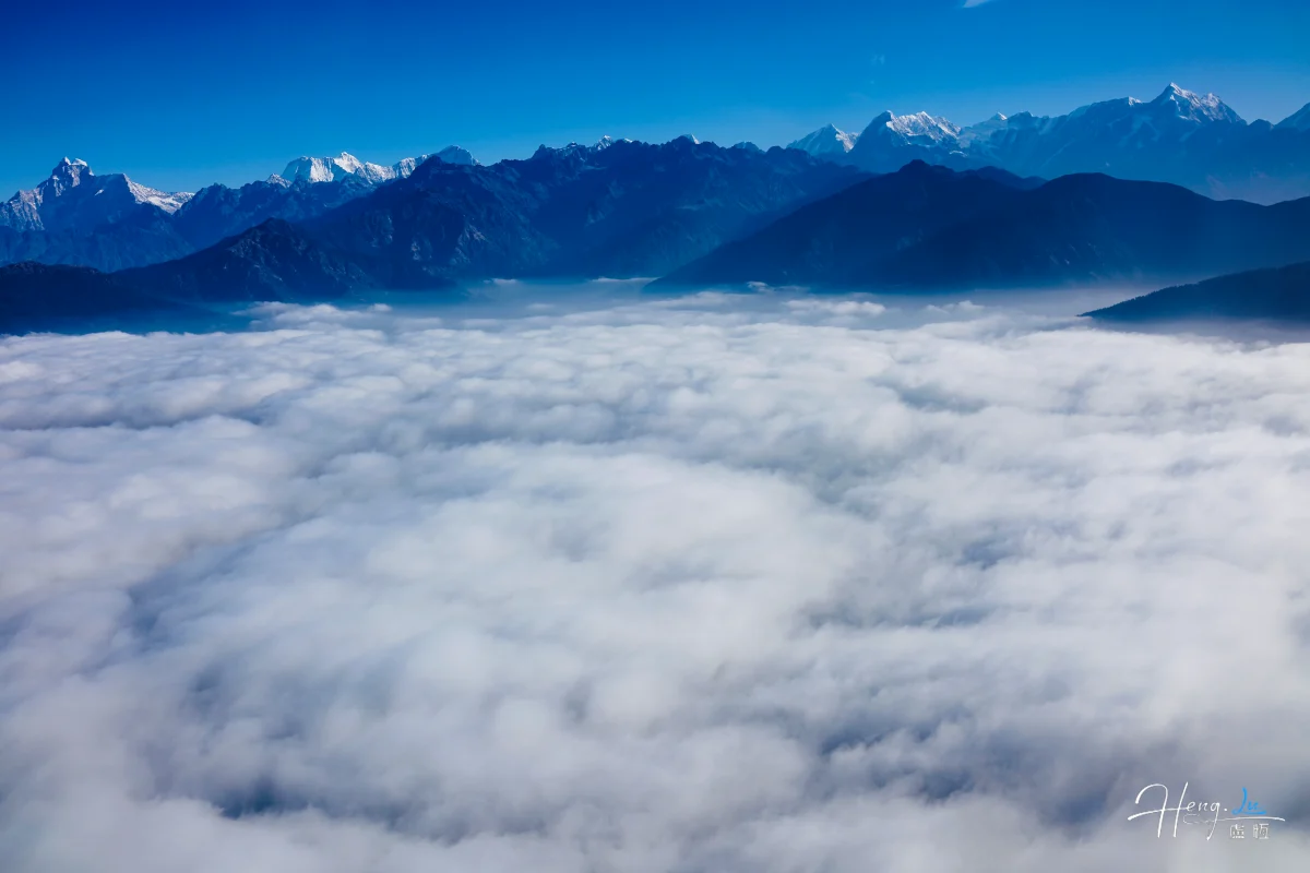 Snow-capped-mountains-above-sea-of-clouds (1) (1)