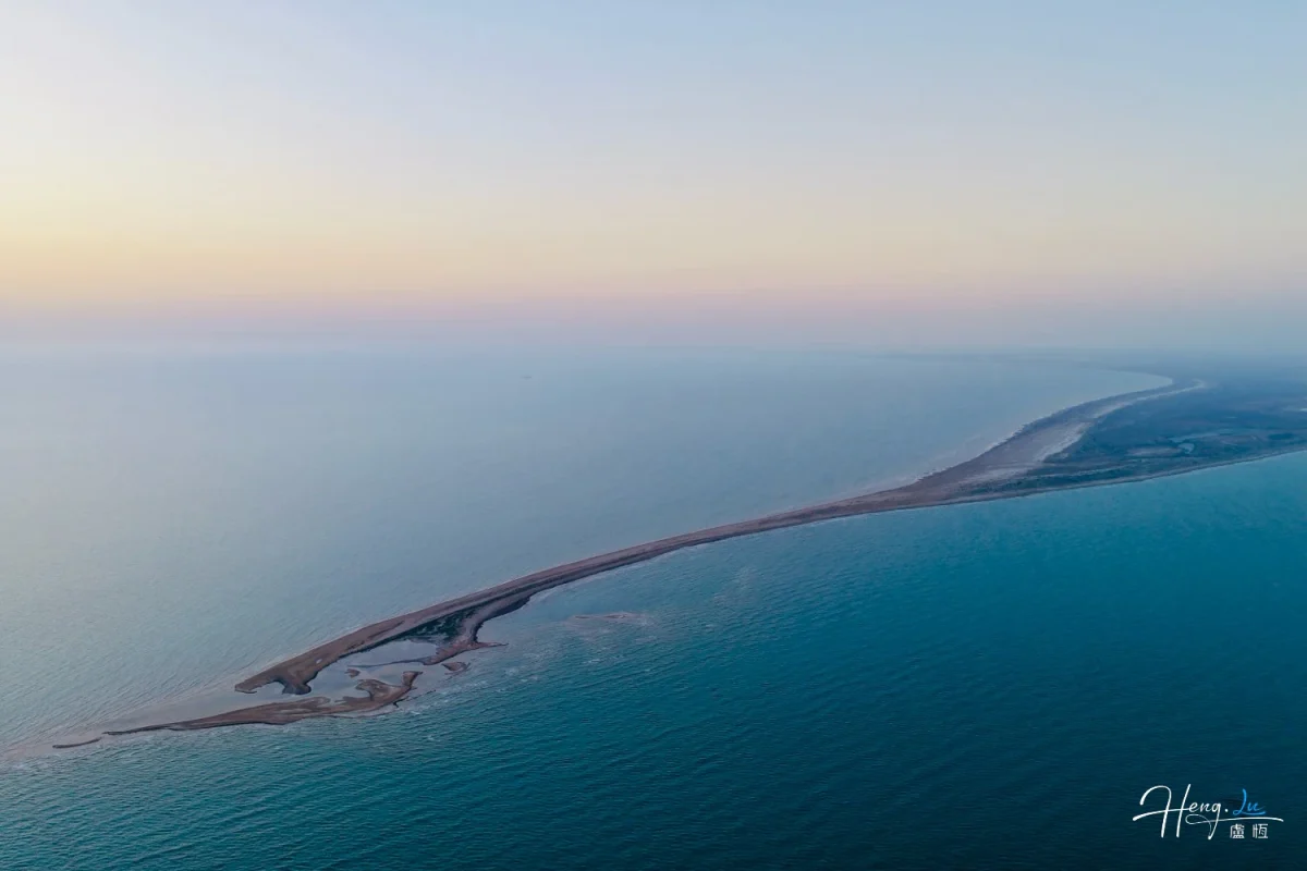 Aerial View Of Coastal Landform At Dusk