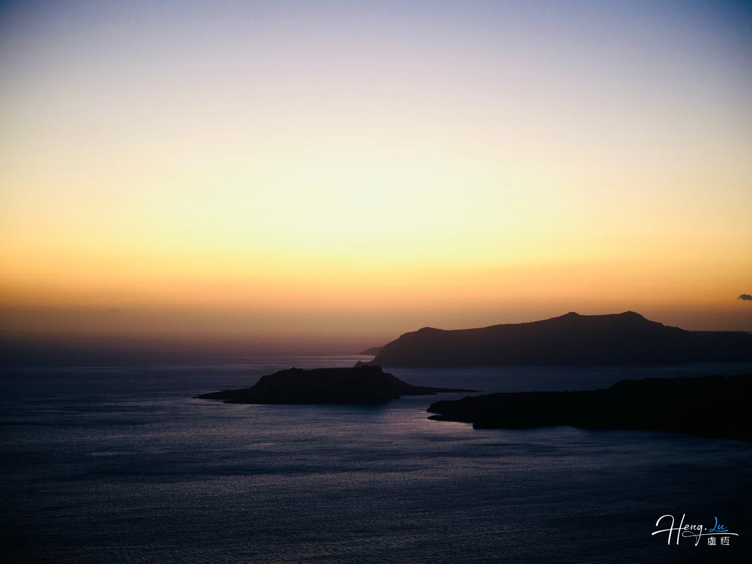 Sunset-over-sea-and-distant-islands