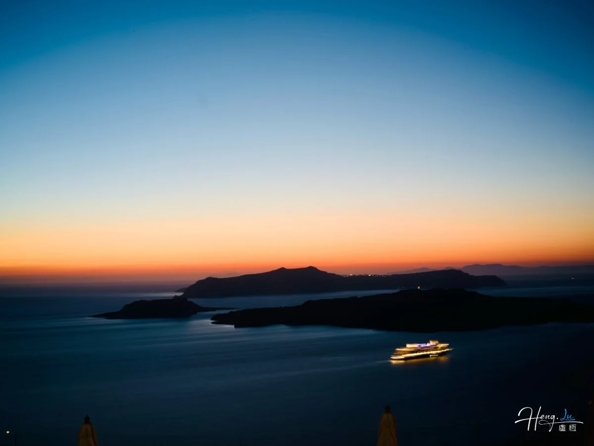 Cruise Ship Sailing Under Evening Sky