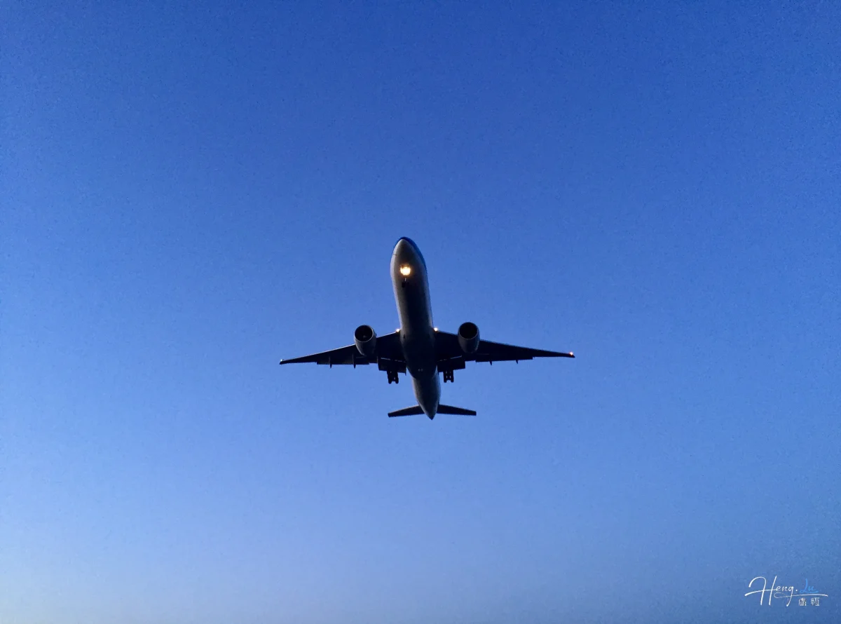 Airplane Flying Against Clear Evening Sky