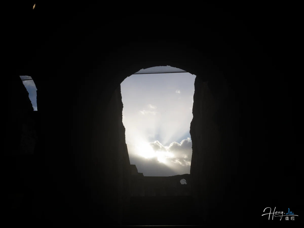 sunlight-streaming-through-ancient-archway (1) (1)