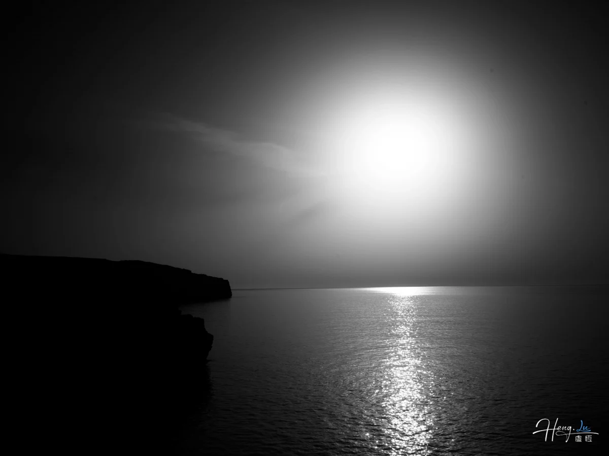 Black And White Seascape With Sun Reflection