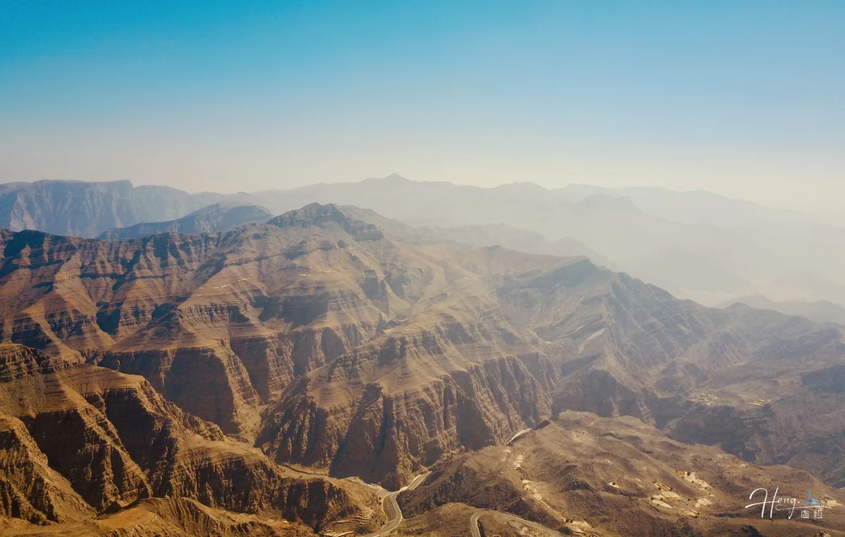 Rugged Mountain Range Under Clear Blue Sky