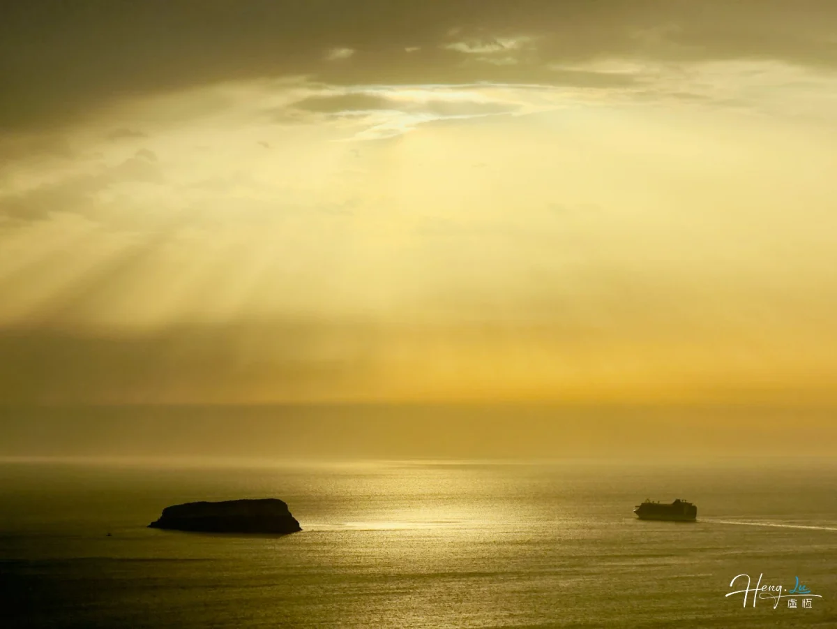 Sunrays Over Sea With Island And Ship