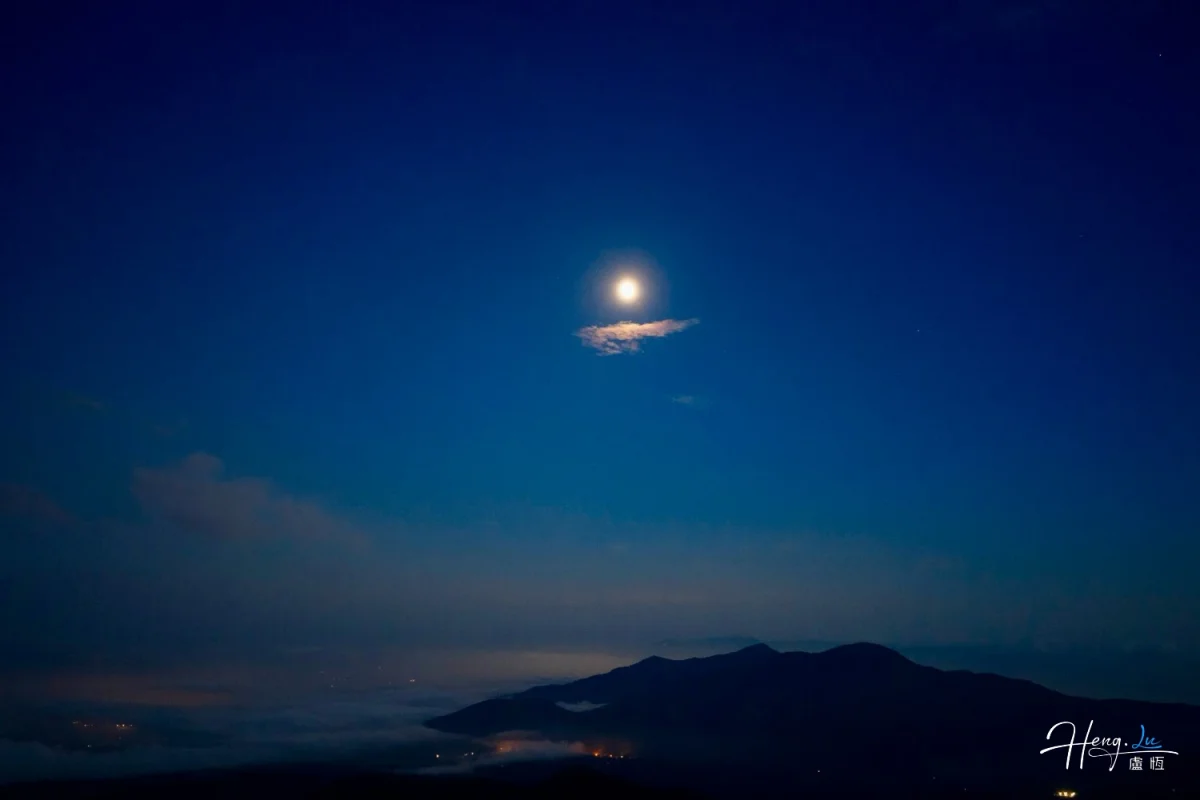 Bright Moon Above Mountains And Night Haze