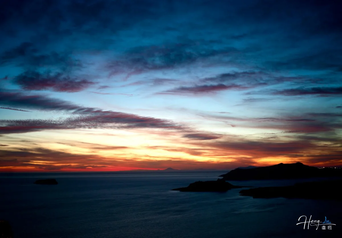 Vibrant Sunset Sky Over Calm Sea