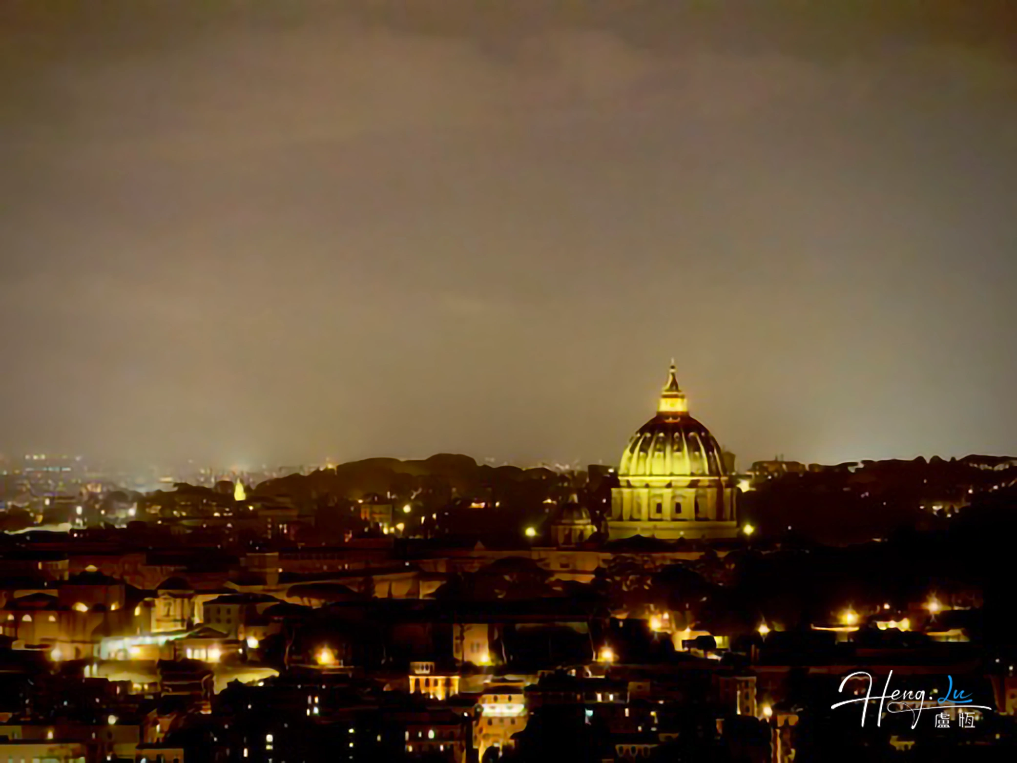 Night view of city with illuminated dome