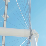A-close-up-of-a-Ferris-wheel-against-sky