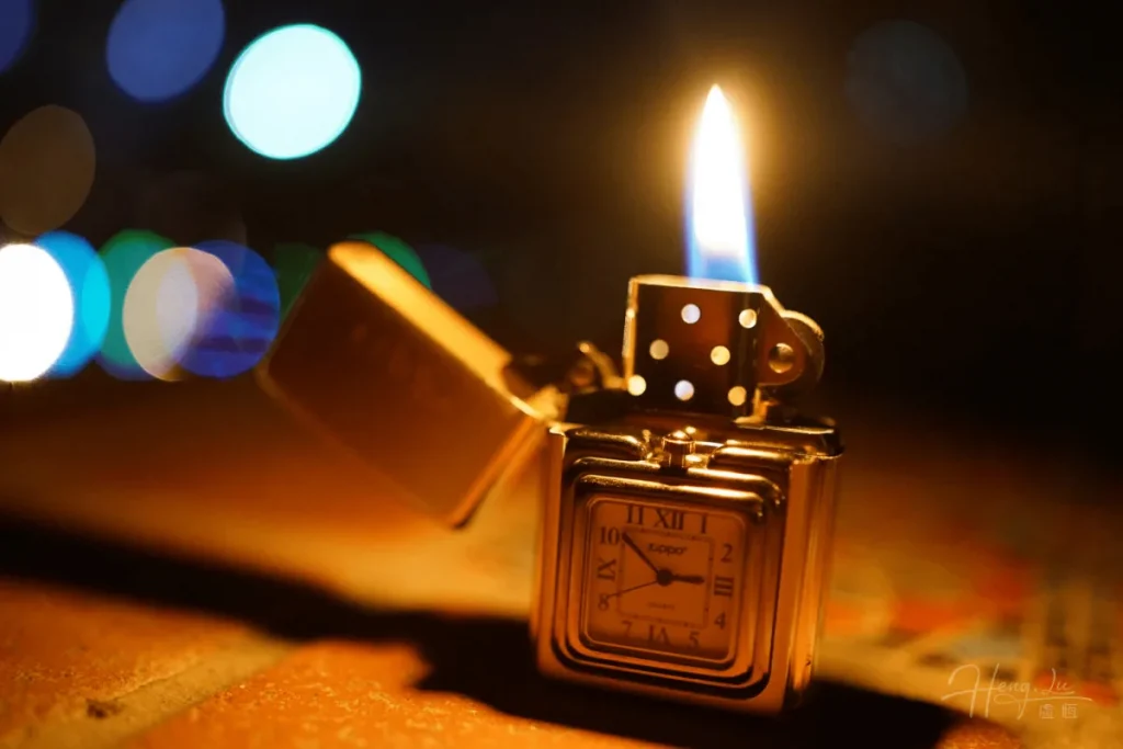 A flame of time A-lit-Zippo-lighter-with-a-clock-face