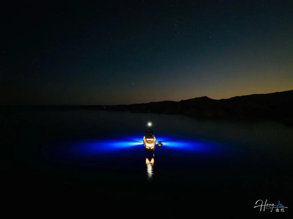A vessel beneath the stars Boat-glowing-blue
