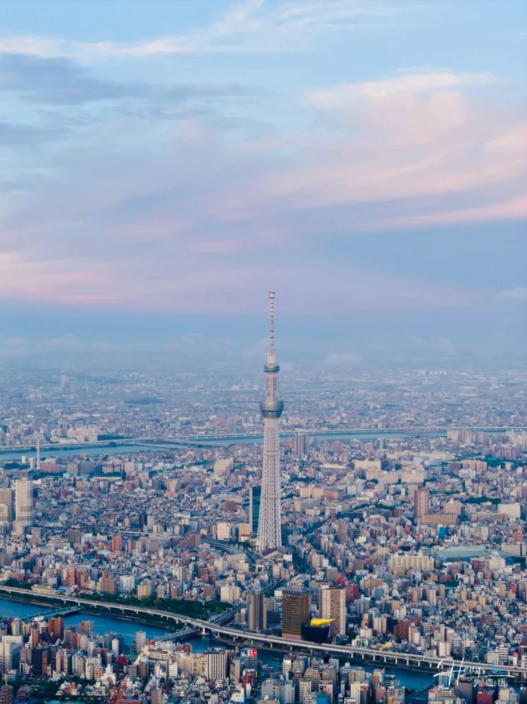 The tower that finds the sky Cityscape-with-prominent-television-tower-at-dusk