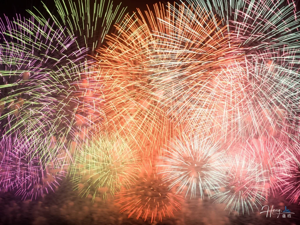 The architecture of celebration Colorful-fireworks-burst-vividly-illuminating-the-night-sky