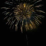 Golden and Blue Firework Bursts in Night Sky Golden-and-blue-firework-bursts-gloriously-against-dark-midnight-sky
