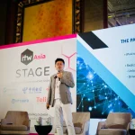 Lu Heng at ITW Asia Luheng-presenting-on-stage-at-tech-conference
