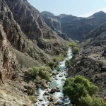 Mountain-valley-with-river-stream-flowing