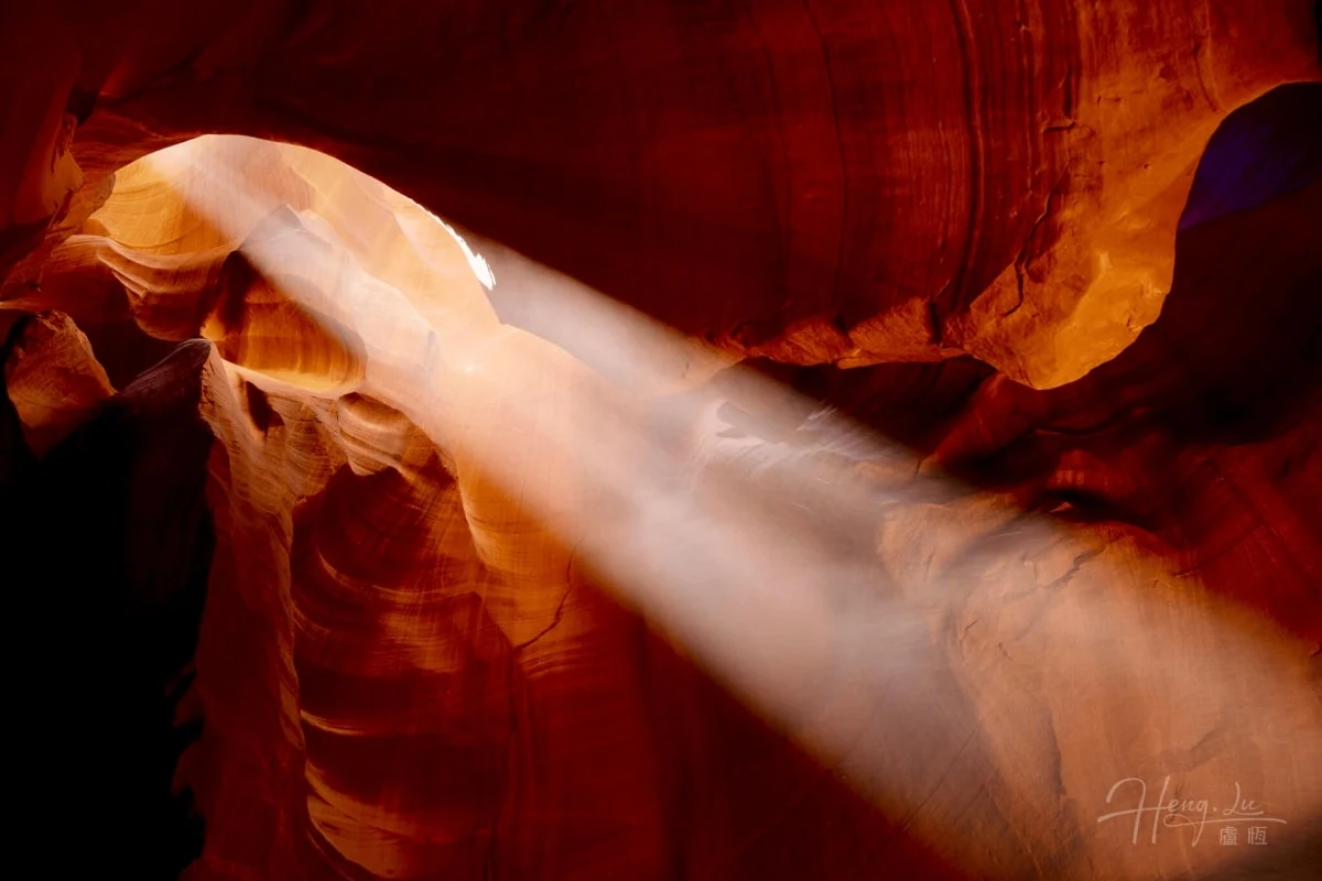 Sunlight Beams Through Antelope Canyon’s Stunning Red Rocks