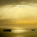 Golden Sunrays Over Sea with Island and Ship Sunrays-over-sea-with-island-and-ship