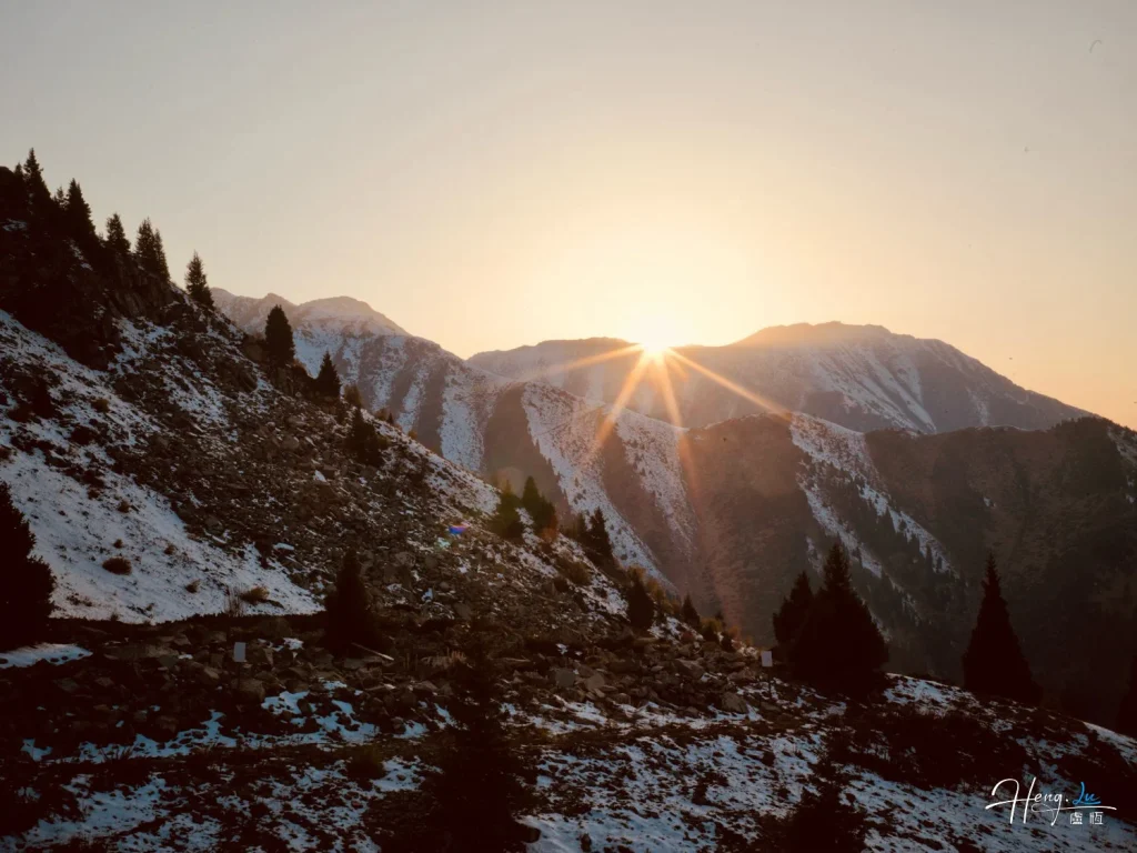 Sunrise Over Snowy Mountains: Where Light Meets Silence Sunrise-over-snowy-mountain-slopes-with-pine-trees