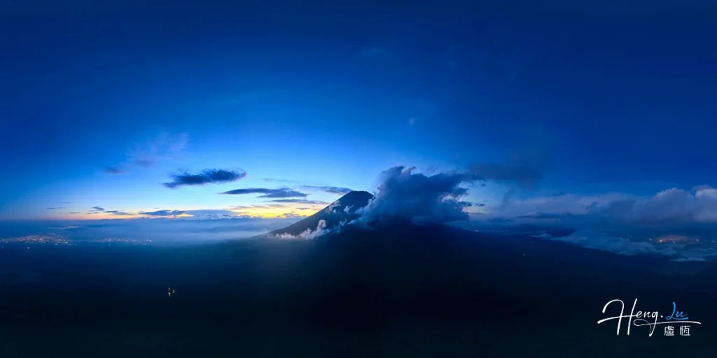 Dawn View of Mountain Peak in Clouds Testing-Mountain-peak-surrounded-by-clouds-at-dawn