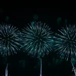 Triple-blue-fireworks-burst-in-night-sky