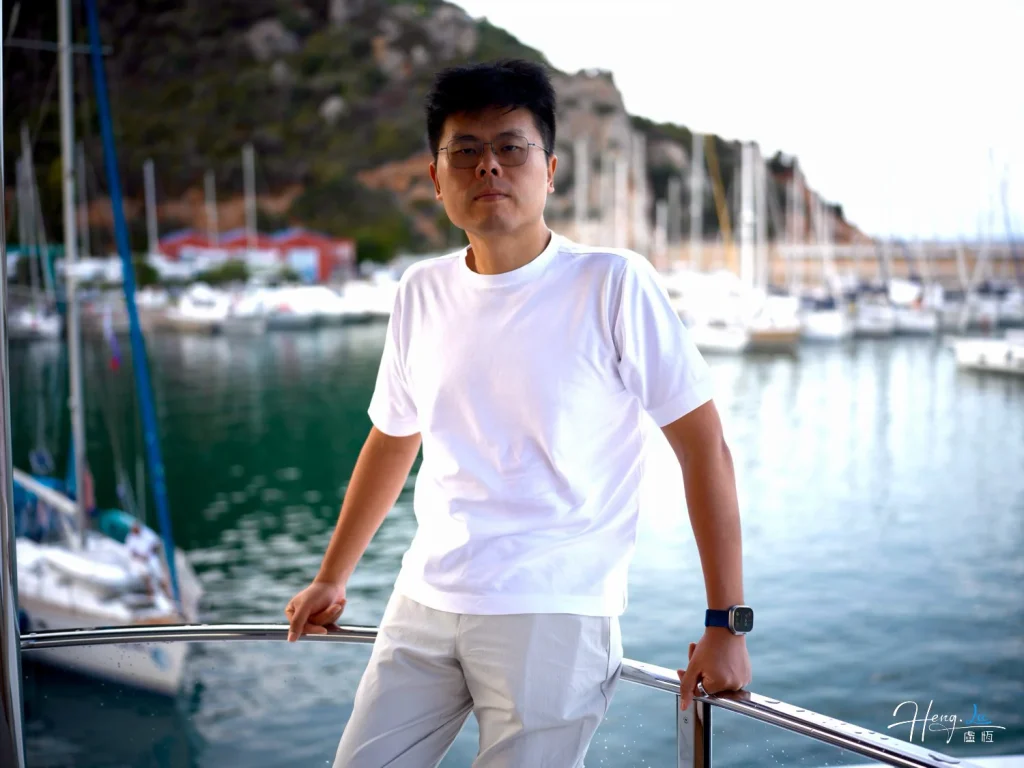 Luheng standing on yacht with marina background luheng-standing-on-yacht-with-marina-background