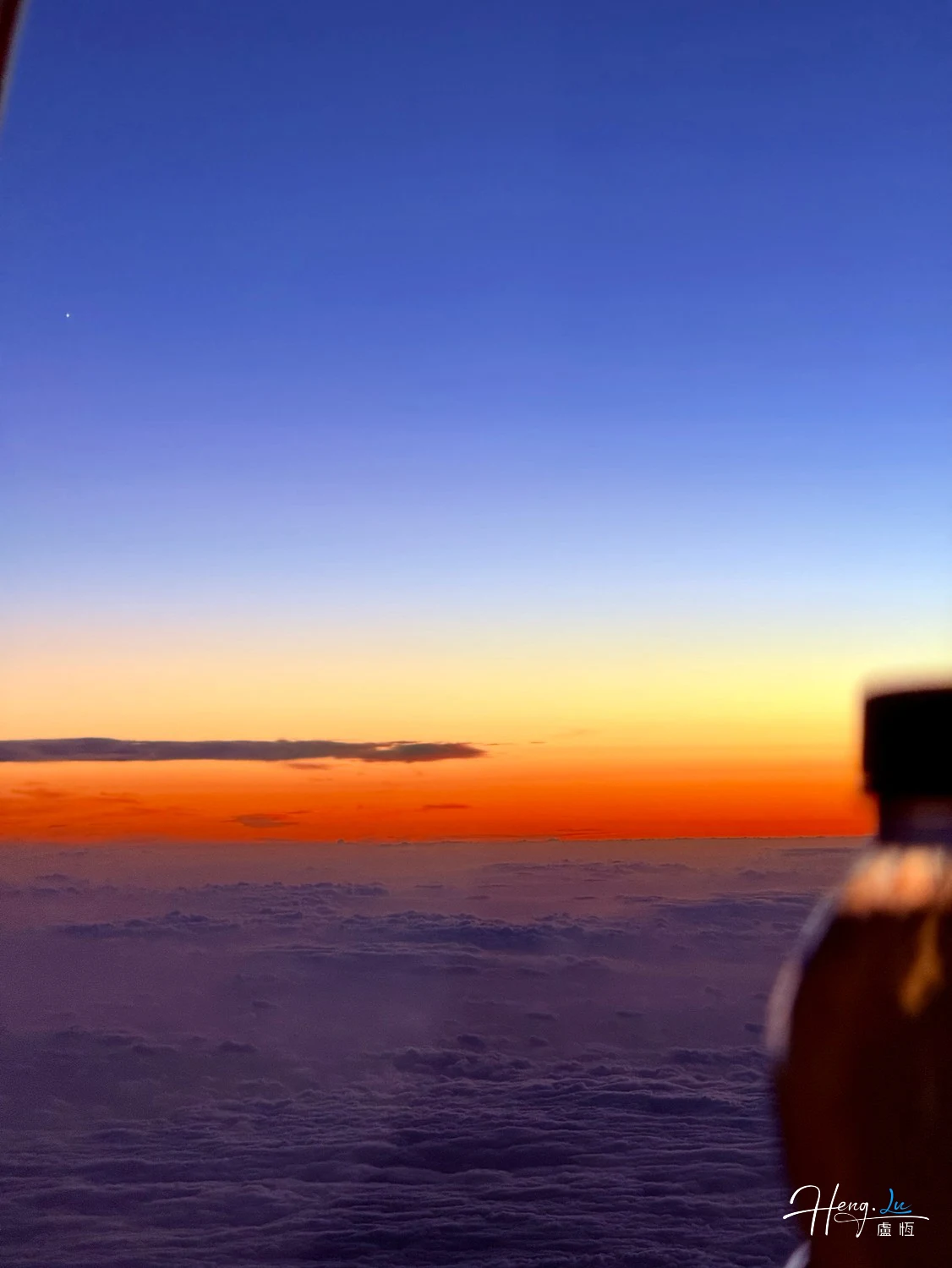 Sunrise-view-above-clouds-from-airplane