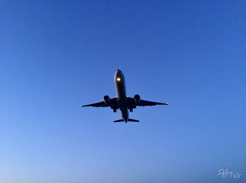 Airplane flying against clear evening sky airplane-flying-against-clear-evening-sky