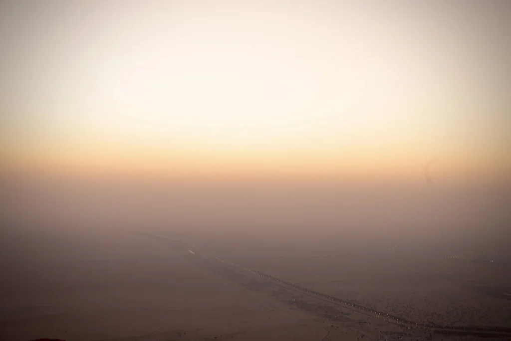 Desert horizon fading into warm sunset sky desert-horizon-fading-into-warm-sunset-sky
