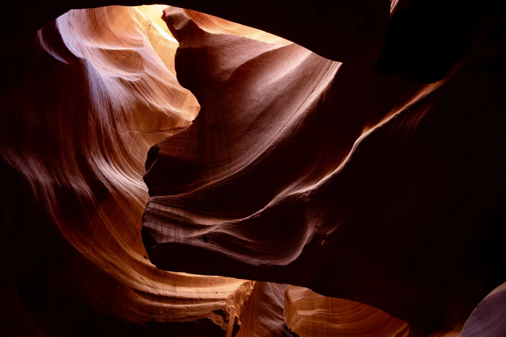 Sunbeam illuminating narrow canyon sandstone-canyon-with-soft-light-beams