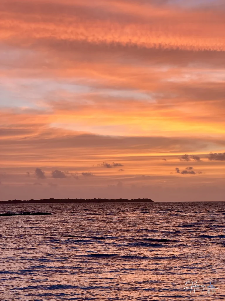 Sunset over ocean with golden clouds sunset-over-ocean-with-golden-clouds