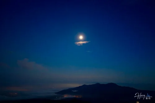 bright-moon-above-mountains-and-night-haze